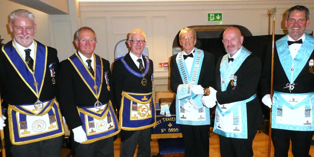 Pictured Left to Right are Keith Ward, Provincial Deputy Grand Director of Ceremonies; Timothy Coleridge, Provincial Senior Grand Warden; Timothy Golder, Assistant Provincial Grand Master; Neil Chapple, Master; Martyn Brooks, Immediate Past Master; James Hodge-Brooks, Lodge Director of Ceremonies