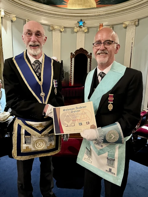W Bro Chris Bird Provincial Mentor presents W Bro Brian Ross with his solomon diploma